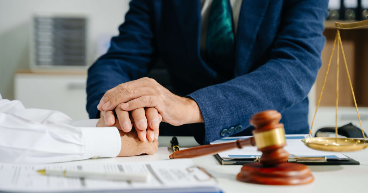 Family attorney lawyer sitting on his desk