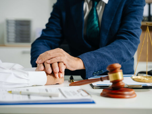 Family attorney lawyer sitting on his desk