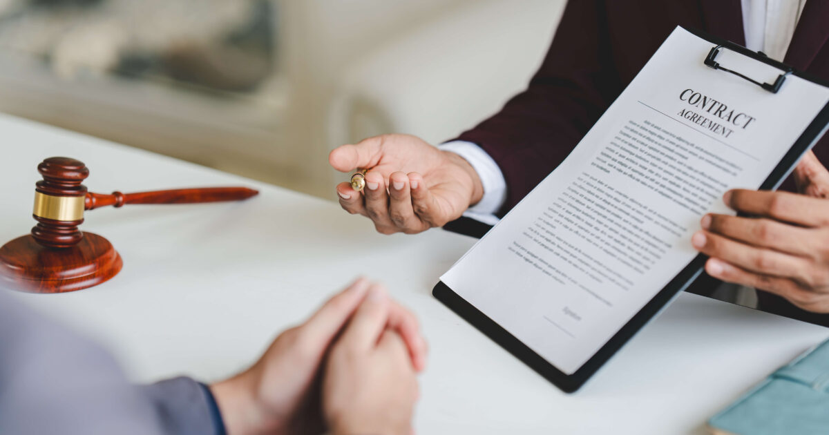 A lawyer explaining a client about a divorce settlement agreement