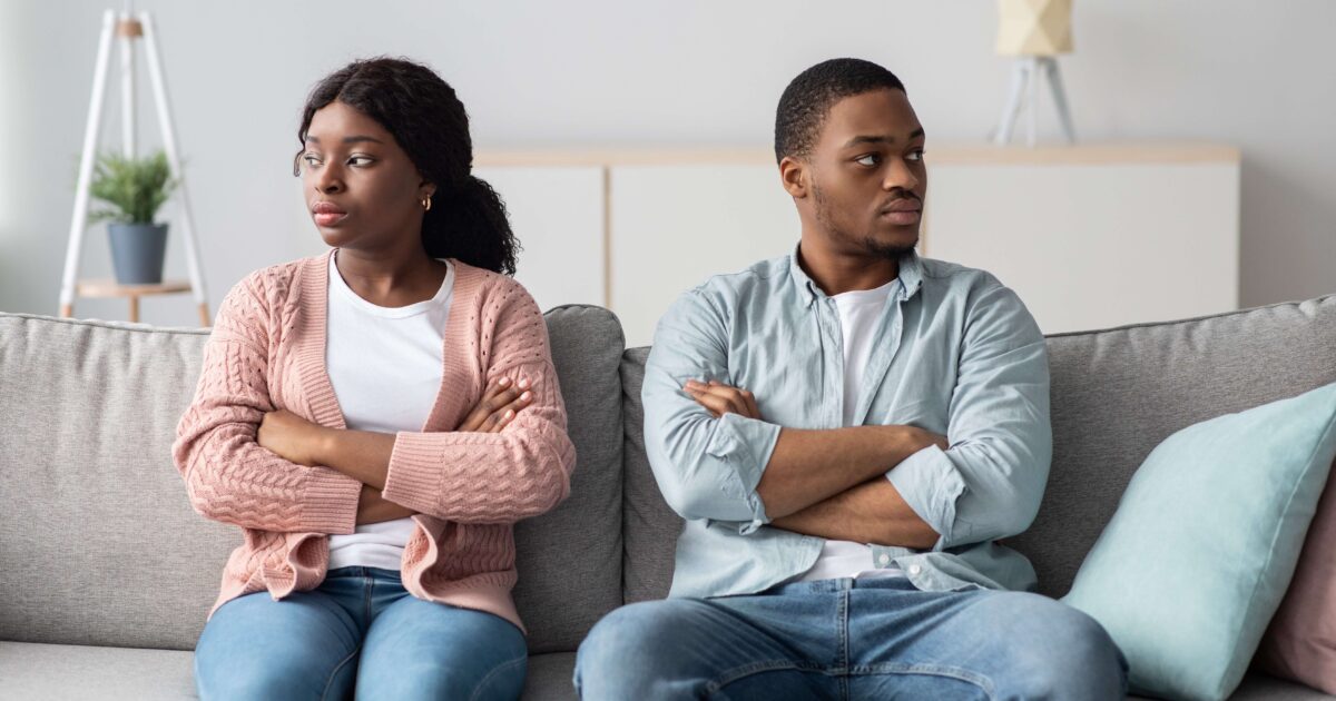 Disappointed african-american couple having relationship issues