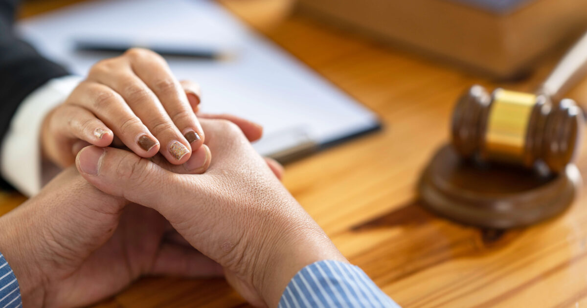 lawyer doing a handshake with the client
