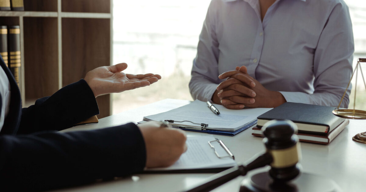 Lawyer giving advice to a client