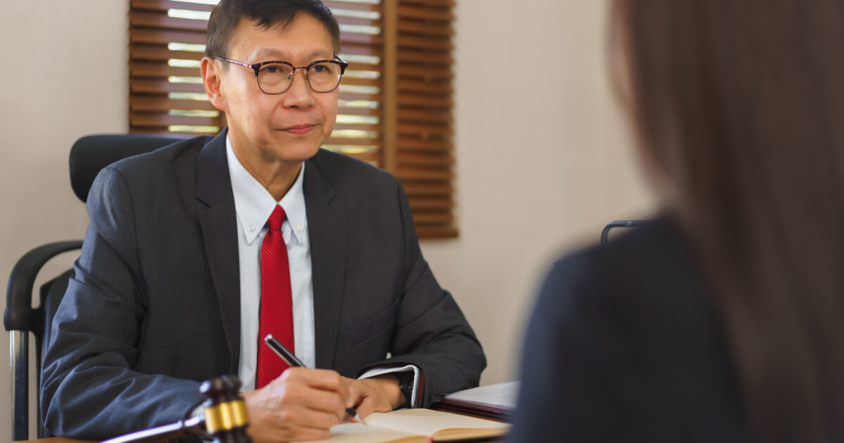 Lawyer talking to his client