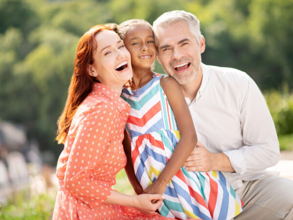 Divorced couple coparenting their child.