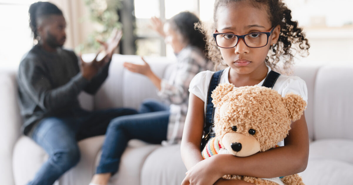 Parents divorcing while kid is sad watching them