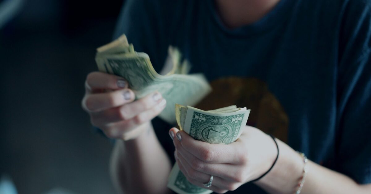 A woman counting money
